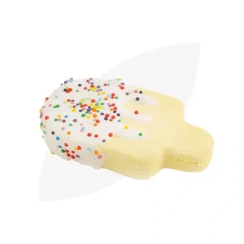 Hand-shaped bath bomb with white glaze and colourful sprinkles